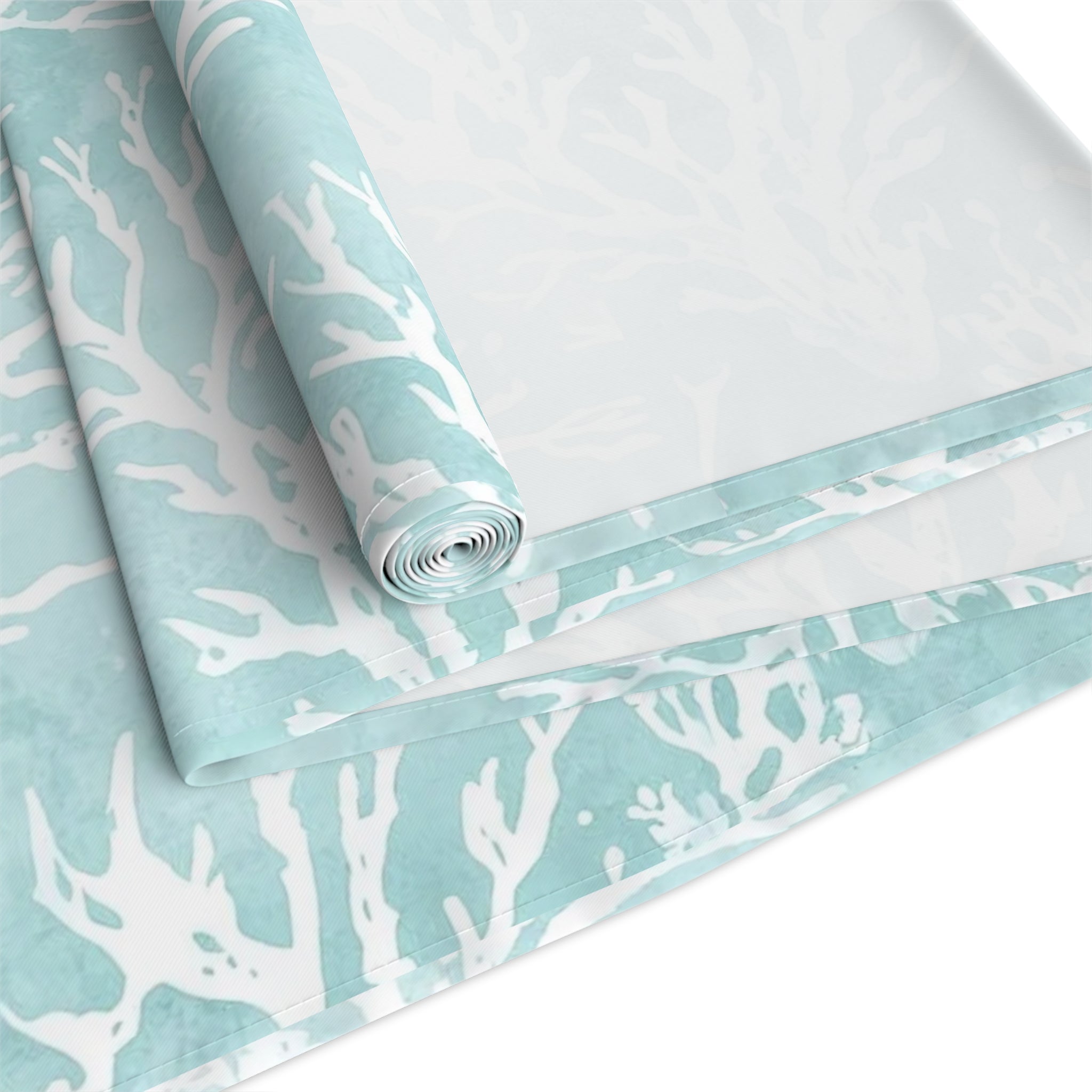 Aqua Sea Coral Pattern Table Runner in seafoam and white coral silhouettes for a calm coastal dining look.