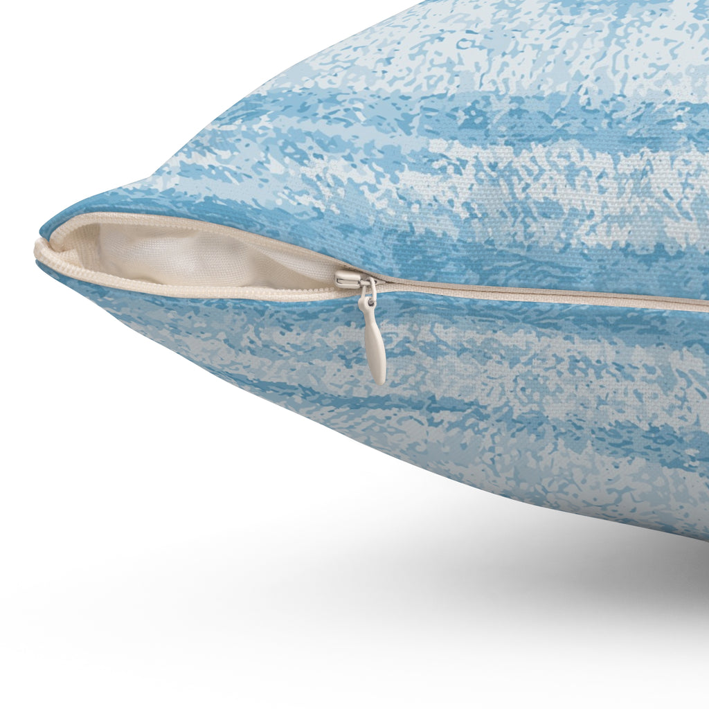 Blue striped coastal throw pillow with pale blue and white watercolor stripes and a zipper.